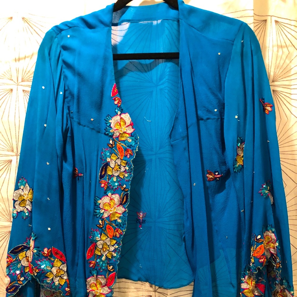 Vintage turquoise sheer top with bell sleeves.